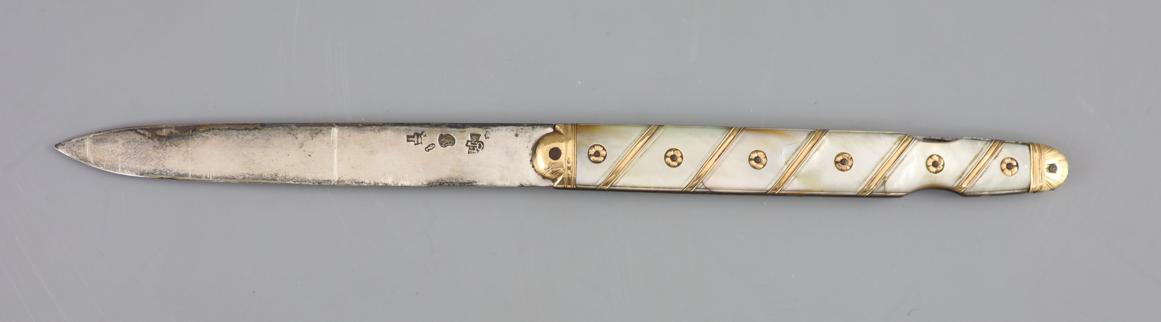 An early 19th century French? gold overlaid and mother of pearl mounted handled fruit/pocket knife,